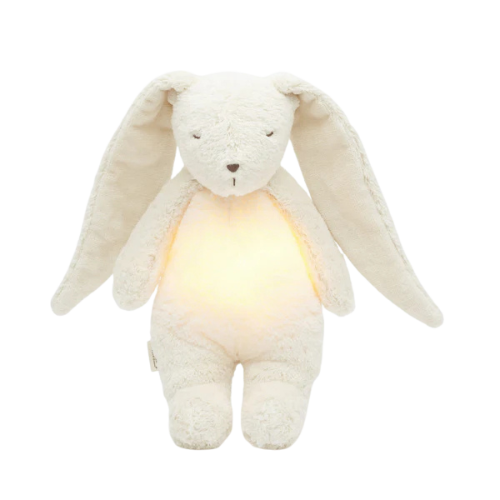 Cream-colored plush bunny with a glowing interior on a white background