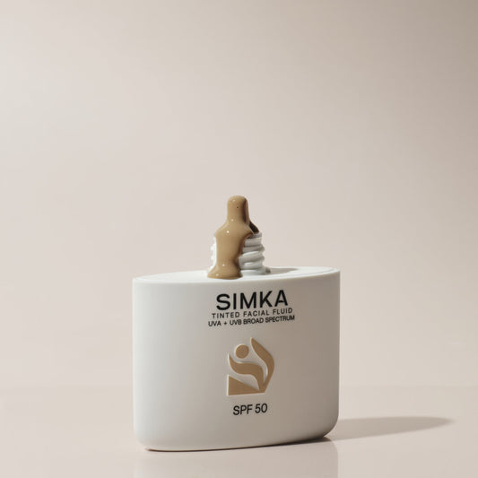 SIMKA tinted skincare product on a beige background
