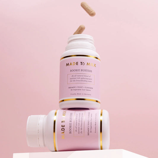 Two 'Made to Milk' Boobie Busters products on a pink background