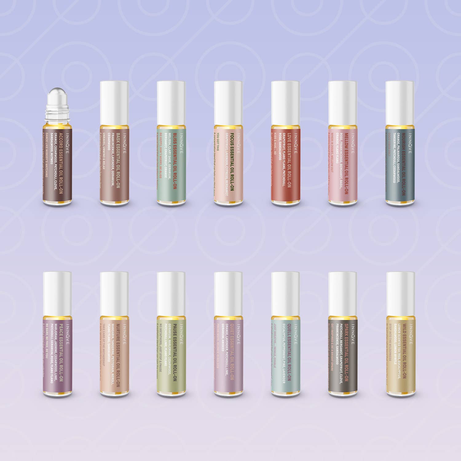 Row of small bottles with metallic caps on a light purple background