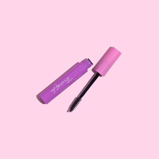 Pink amoris beauty hair styling wand on a pink background