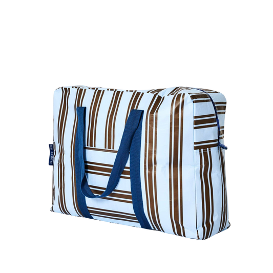 Striped bag with blue handles