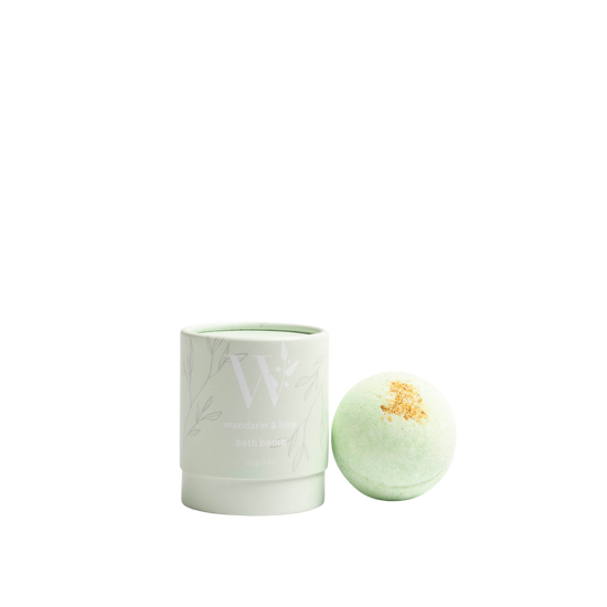 Wheelers Hill Soap Mandarine & Lime Green bath bomb with a cylindrical container on a transparent background