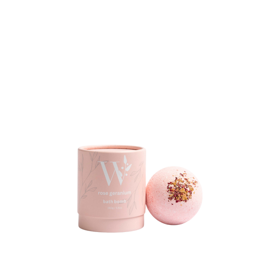 Wheelers Hill Soap Rose Geranium Pink bath bomb with a cylindrical container on a transparent background