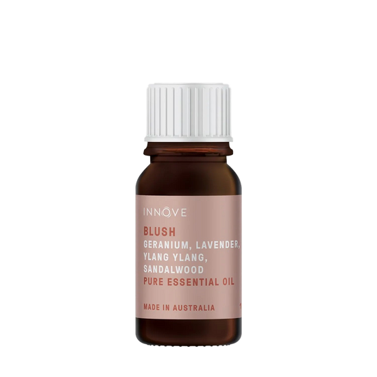 10mls Essential oil bottle named Blush with orange, cedarwood, patchouli, clove, geranium, lavender, ylang ylang and sandalwood with a white cap on a Transparent background