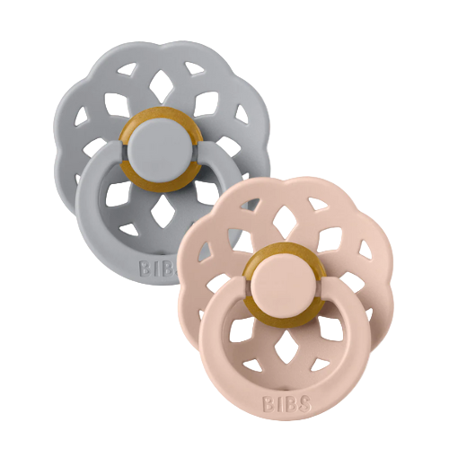 Set of two BIBS Boheme pacifiers featuring cloud and blush colors, flower-style silicone shields—premium baby soothers for newborns and infants. Round, size one.