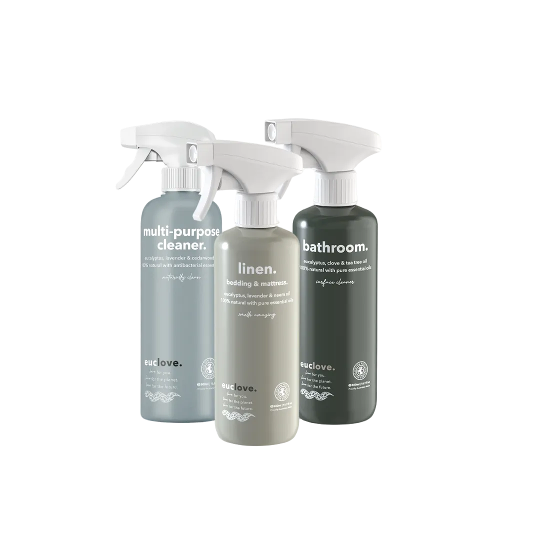 Three eco-friendly cleaning spray bottles labeled 'multi-purpose cleaner', 'linen', and 'bathroom'