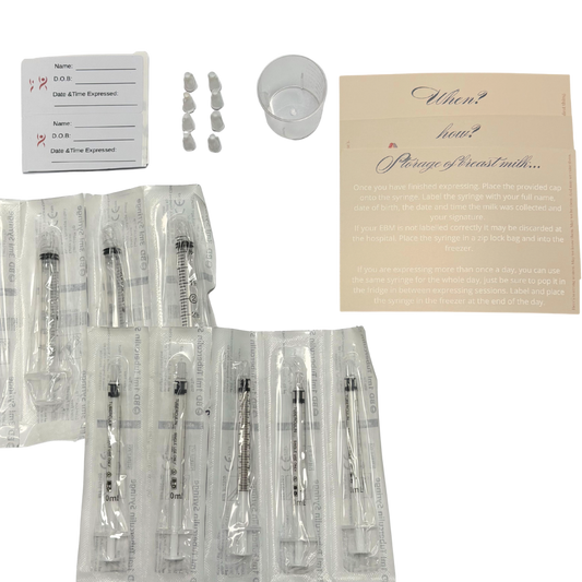 syringes, labels, caps, cup and instruction cards on a white background