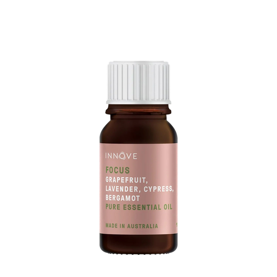 10mls Essential oil bottle named Focus with grapefruit, lavender, cypress and bergamot with a white cap on a Transparent background