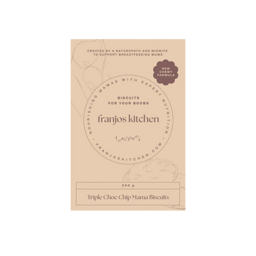 A package of Franjos Kitchen Triple Choc Chip Mama Biscuits. The packaging is a light tan/beige color with elegant black typography and subtle line-art illustrations of a woman holding a teacup and a chocolate chip cookie.