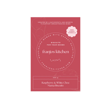 A rectangular pink package for Franjos Kitchen 'Raspberry & White Choc Mama Biscuits' The package features white text and a small white cloud badge indicating a 'New Chewy Formula'.