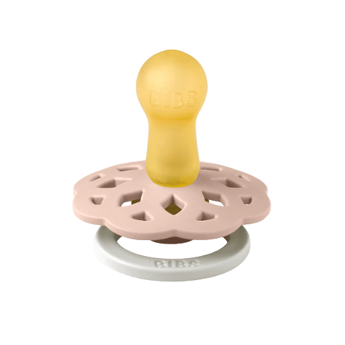 Set of two BIBS Boheme pacifiers featuring blush colour, flower-style silicone shields, and white ring handles—premium baby soothers for newborns and infants. Glow in the dark, round, size one.