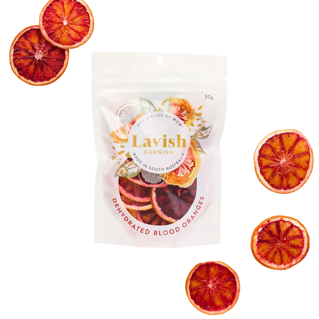Packaging of Lavish Garnish dehydrated blood oranges with sliced oranges on a white background