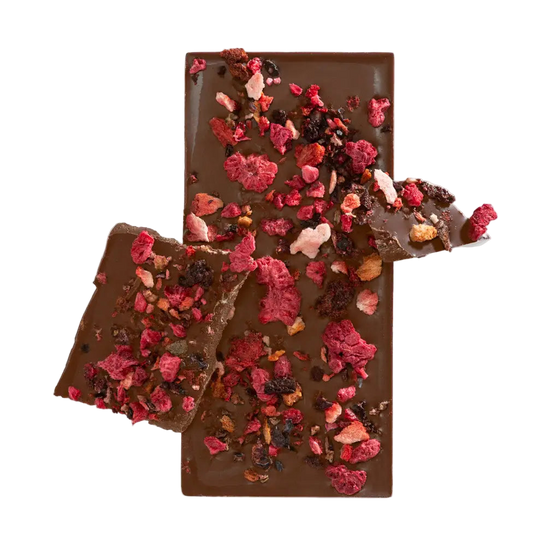 Chocolate bar with dried fruits on a white background