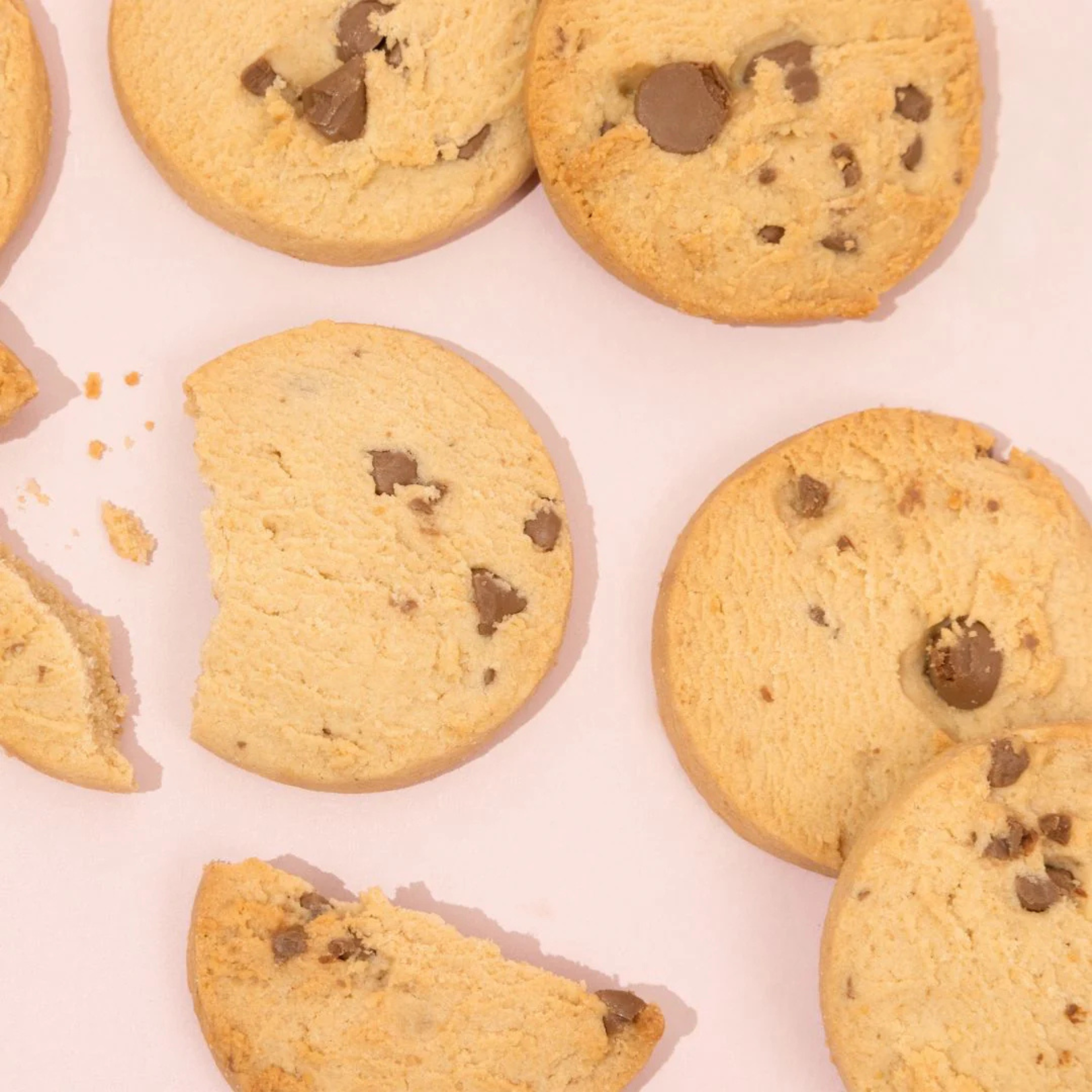 made to milk Chocolate chip cookies on a light pink background