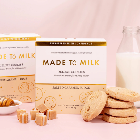 Boxes of 'Made to Milk' salted caramel fudge cookies with cookies and a bottle of milk