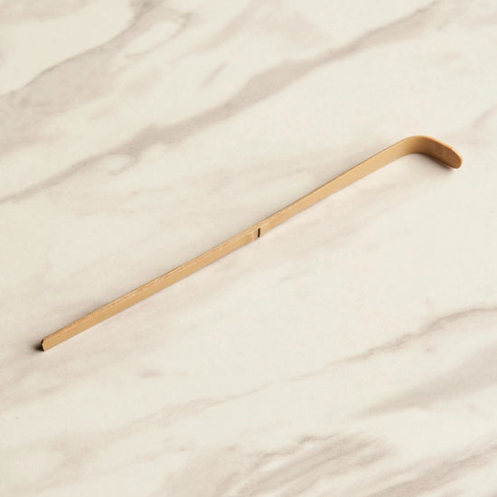 Matcha Bamboo Scoop on marble background