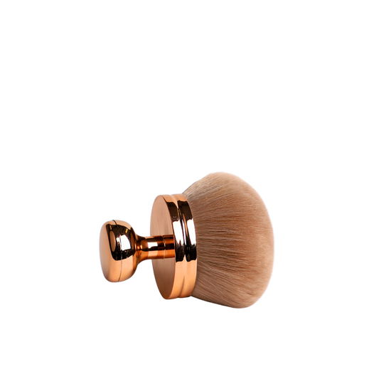 Makeup brush with rose gold handle 