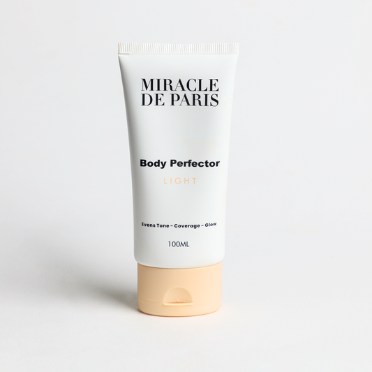 Tube of Light Miracle de Paris Body Perfector on a light gray background
