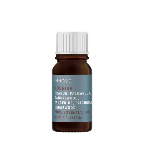 10mls Essential oil bottle named Nourish with orange, palmarosa , sandalwood, tangerine, patchouli and cedarwood and ylang ylang with a white cap on a Transparent background