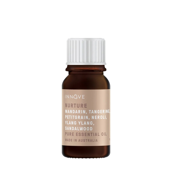 10mls Essential oil bottle named Nurture with mandarin, tangerine, petitgrain, neroli, ylang ylang and sandalwood with a white cap on a Transparent background