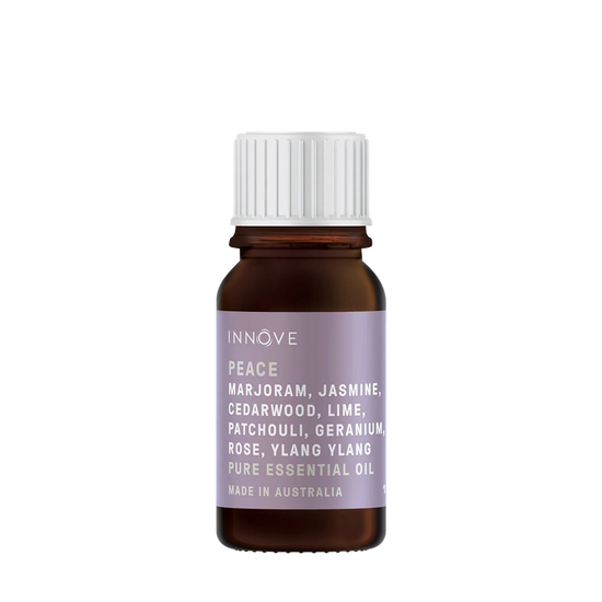 10mls Essential oil bottle named peace with marjoram, jasmine, cedarwood, lime, patchouli, geranium, rose and ylang ylang with a white cap on a Transparent background