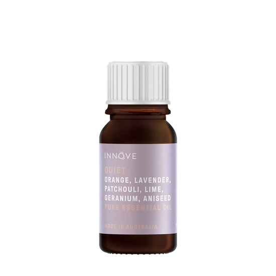 10mls Essential oil bottle named Quiet with orange, lavender, patchouli, lime, geranium and aniseed with a white cap on a Transparent background