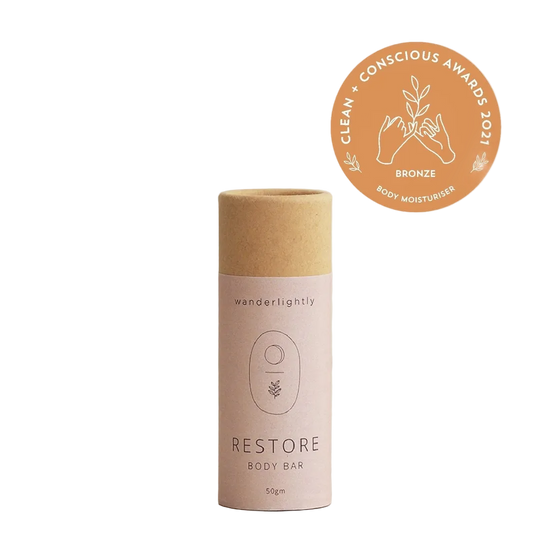 Wanderlightly Restore body bar packaging with a bronze award badge