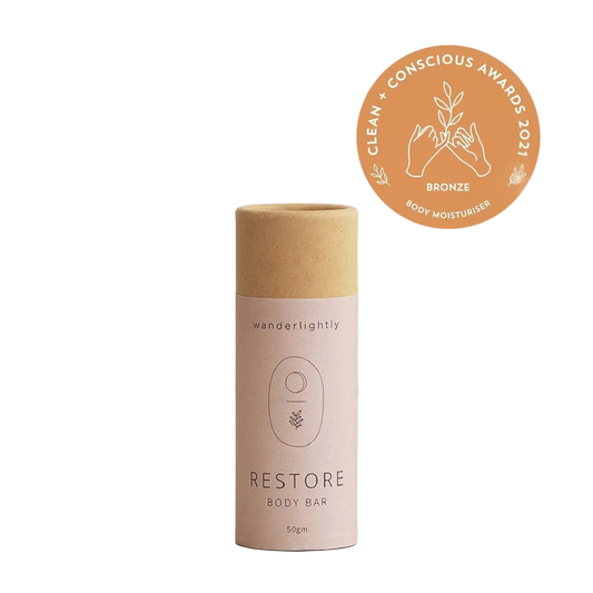 Wanderlightly Restore body bar packaging with a bronze award badge