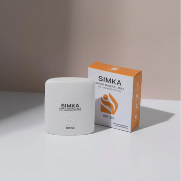 SIMKA sunscreen product and packaging on a neutral background