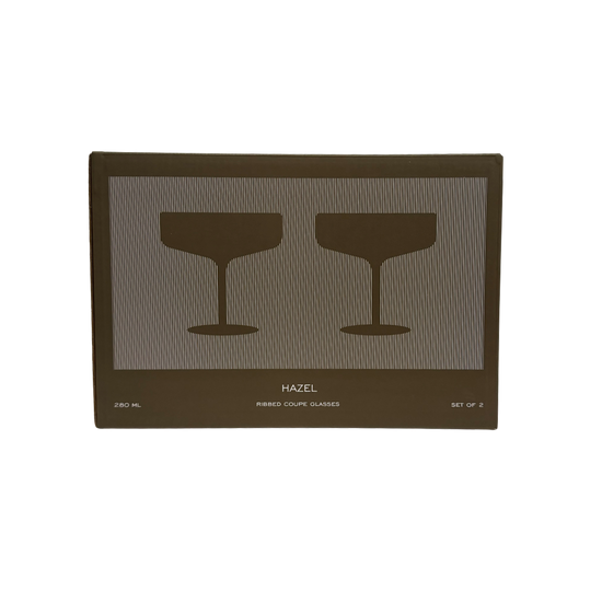 Green box with two glasses on it on a white background