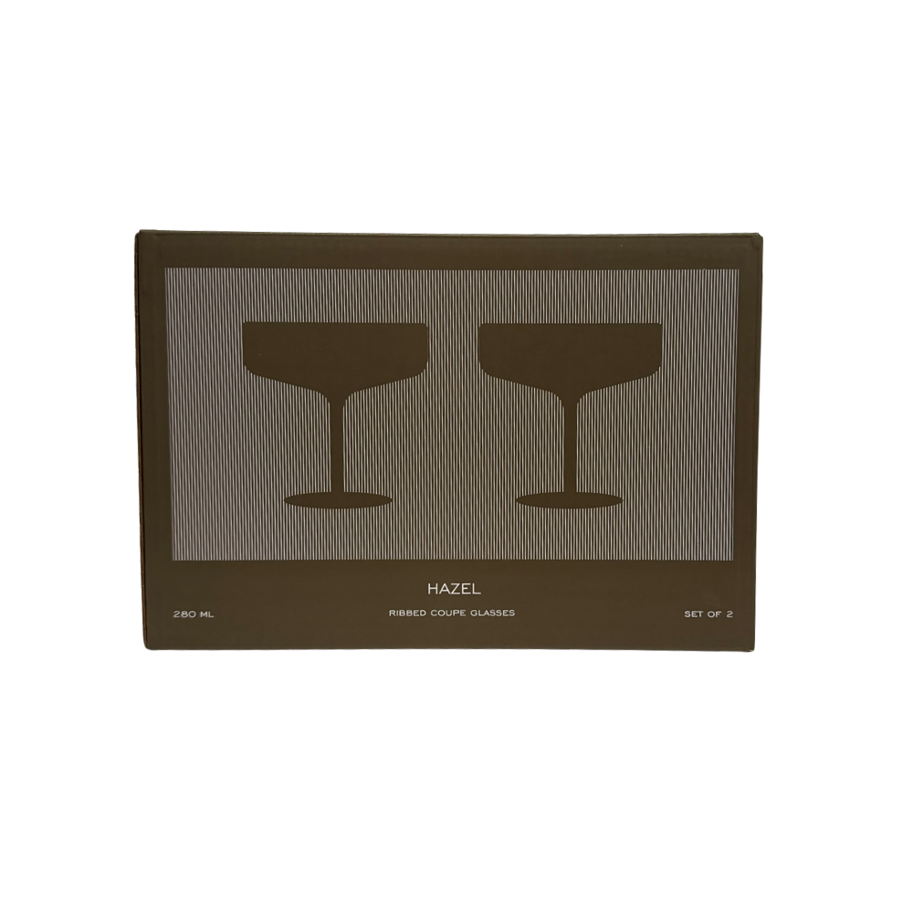 Green box with two glasses on it on a white background