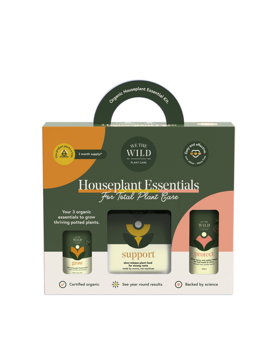 We the Wild Houseplant Essentials packaging with three small bottles on a pink background