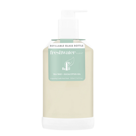 Refillable glass bottle with a green label on a white background