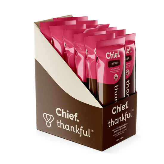 Chief Thankful chocolate-covered dried fruit packages in a display box 