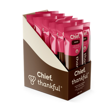 Chief Thankful chocolate-covered dried fruit packages in a display box 