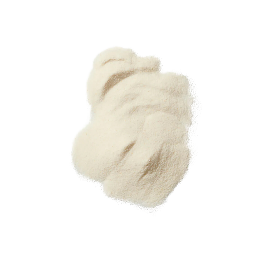 Pair of cream-colored fuzzy socks on a white background