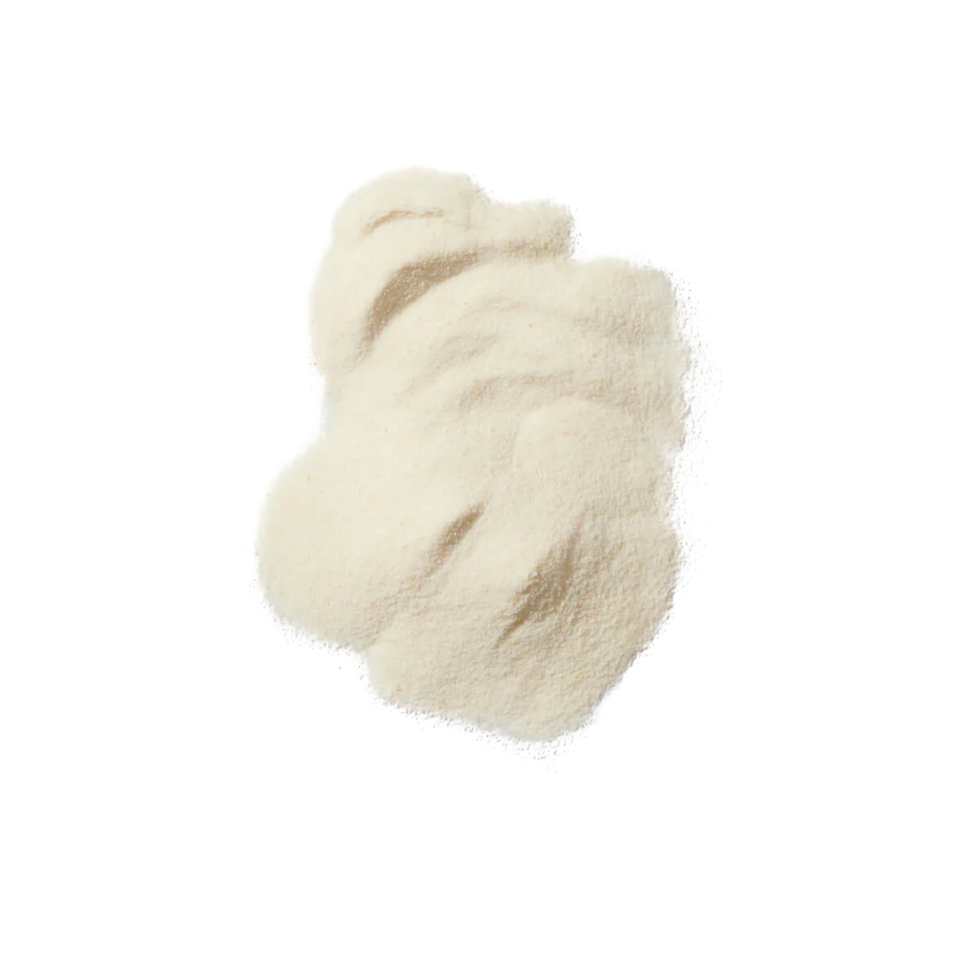 Pair of cream-colored fuzzy socks on a white background