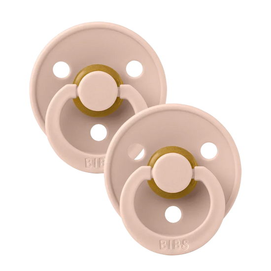 Two baby bibs dummies blush.