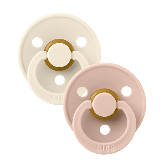 Two baby bibs dummies ivory and blush.