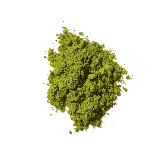 Green powder on a white background