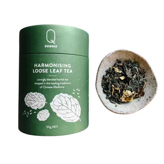 Harmonising loose leaf tea canister 50g . Little bowl of loose tea.