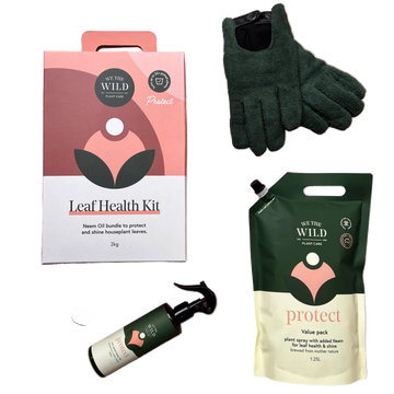 Leaf Health Kit we the wild with packaging, gloves, and spray bottle on a transparent background