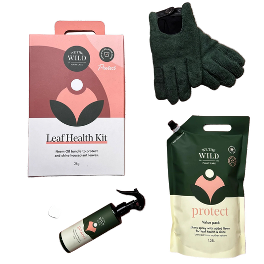 Leaf Health Kit we the wild with packaging, gloves, and spray bottle on a transparent background