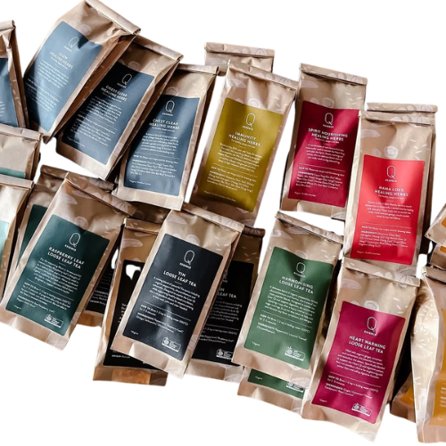 Assorted tea packages with visible brand logos on a white background