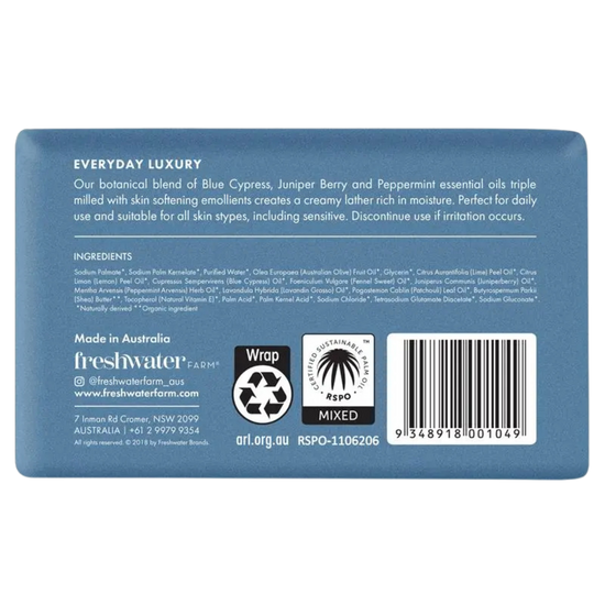 Back label of a blue cypress juniper berry oil soap bar with freshwater farm branding 