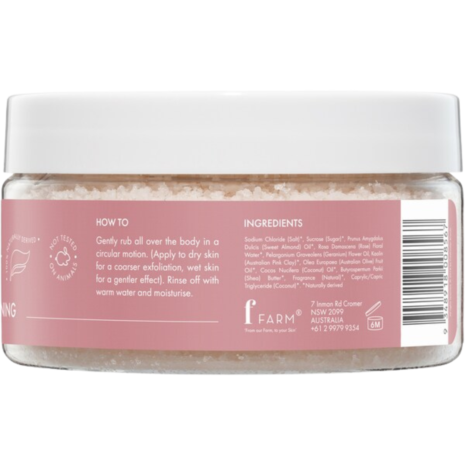 Jar of body scrub with a pink label rosewater + pink clay