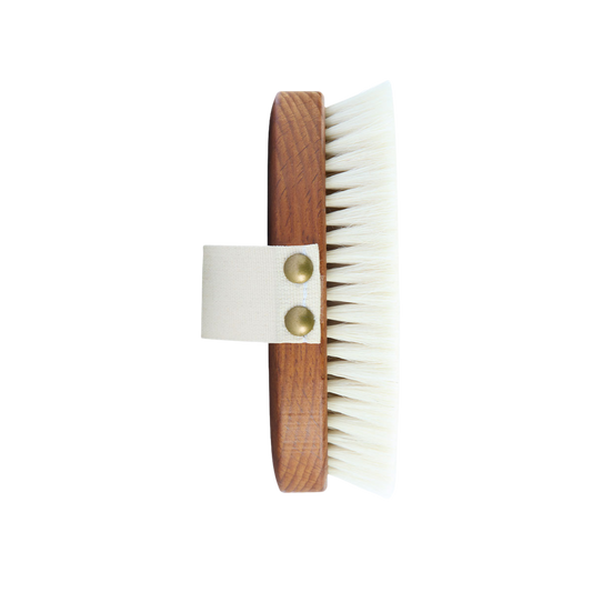 Wooden brush with white bristles. Body brush for gentle massage with goat hair
