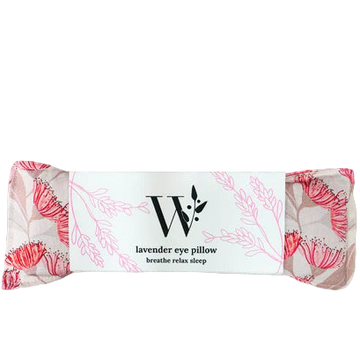 Lavender eye pillow with floral design and W logo on a white background