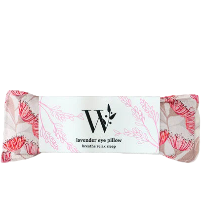 Lavender eye pillow with floral design and W logo on a white background